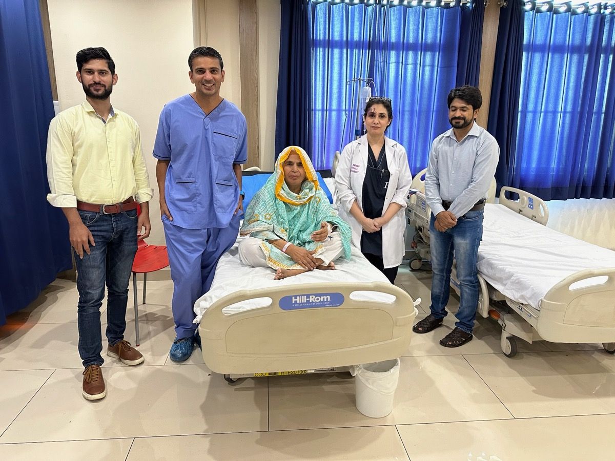 Medical team with recovering patient in Lahore